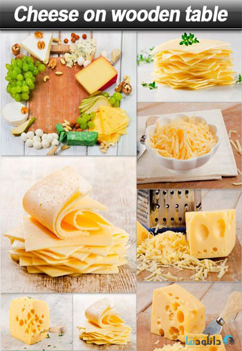 استوک-Cheese-on-wooden-table